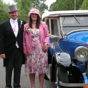 Man and woman dressed for a wedding