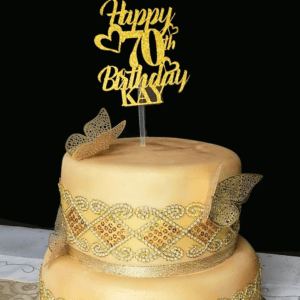 70th two tier birthday cake with gold decoration and butterflies