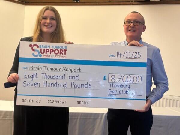 Ellie from Brain Tumour Support and Rob Poole from Thornbury Golf Club